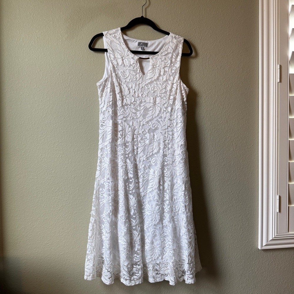 white lace dress with gold bar detail